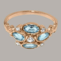 Britanci napravio je 10k ružični zlatni prsten sa sintetičkim kubnim cirkonijom i prirodnim plavim topazom