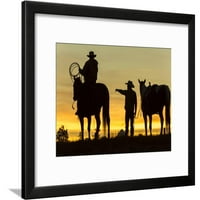 Kauboji i konji u silueti u zoru na ranču, Britanska Kolumbija, Kanada, životinje Figurativna uokvirena